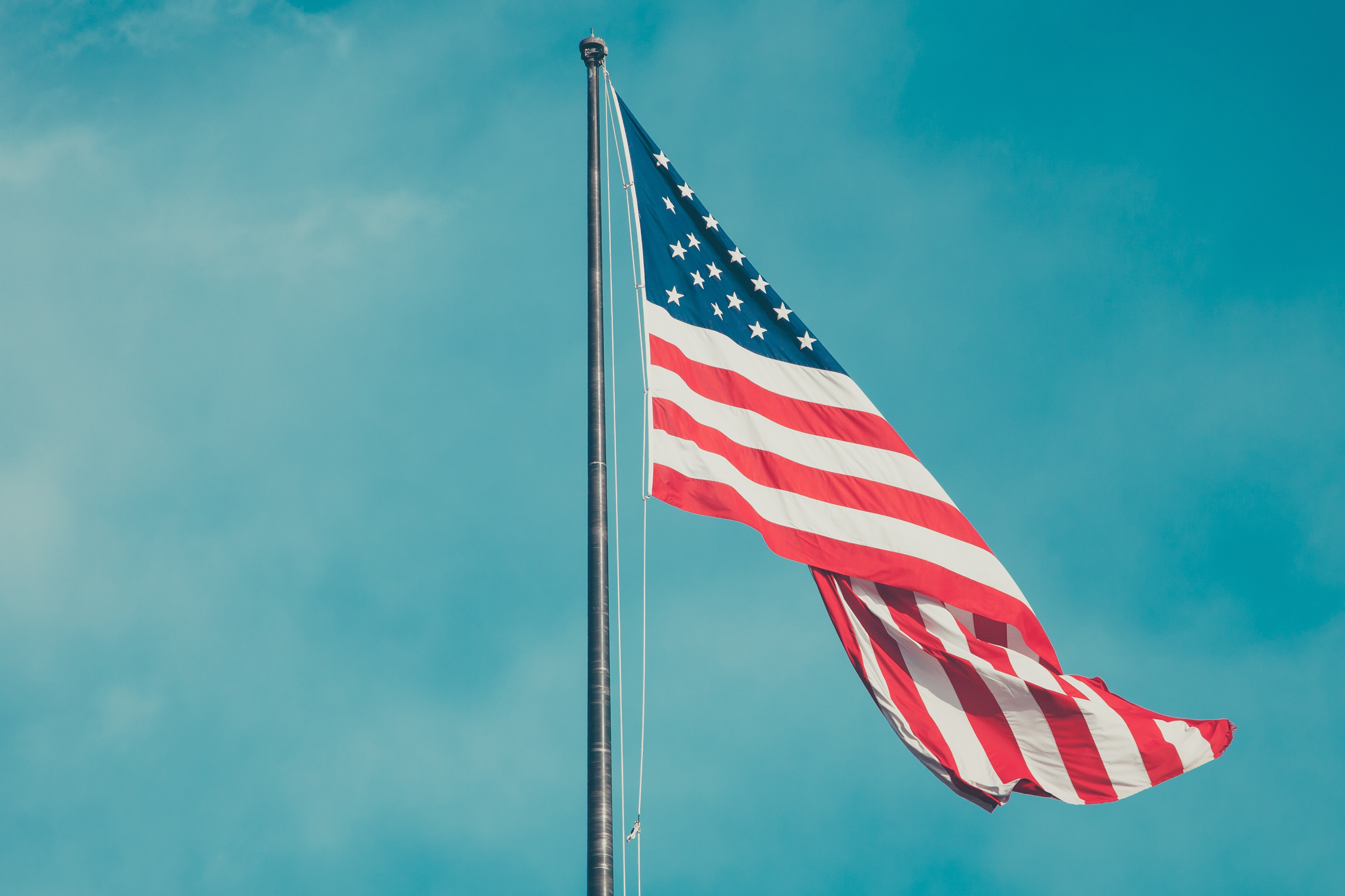 American flag fluttering in sky http://barnimages.com/ | The Gingham Apron